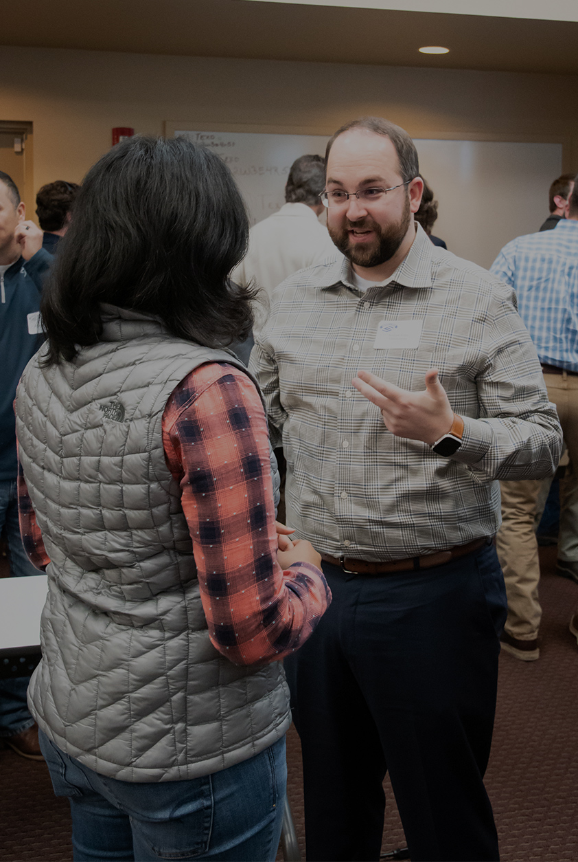 two people during a lean community event in michigan for networking professionals